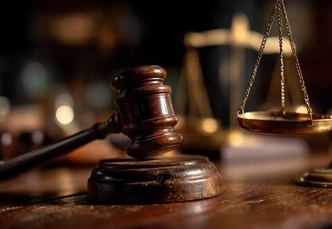 Legal Instruments on Wooden Table