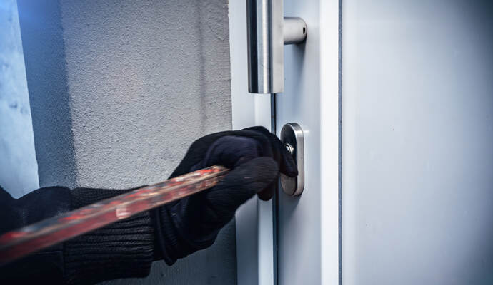masked burglars breaking and entering into a victim's home 