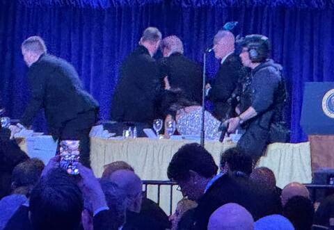 Secret Service Agenten reagieren während des Gala-Dinners