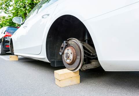 Car with stolen wheels