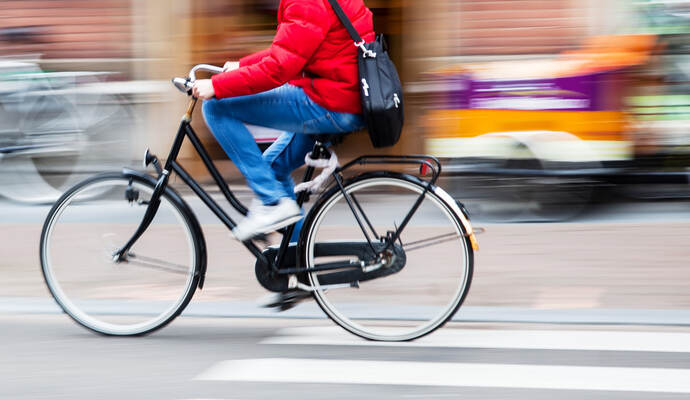 bicycle rider in the city in motion blur