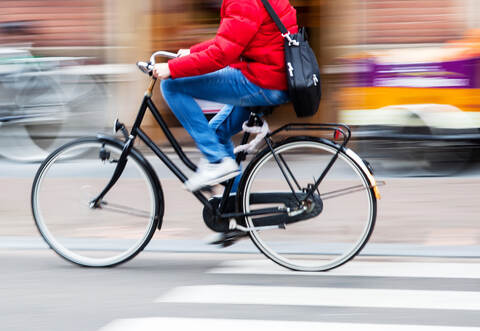 bicycle rider in the city in motion blur