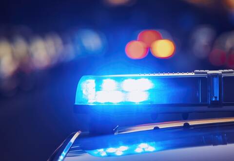 Siren light on roof of police car