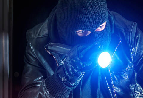 masked burglars breaking and entering into a victim's home 