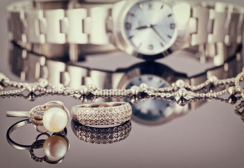 Elegant ring made of silver and silver chain and women's watches