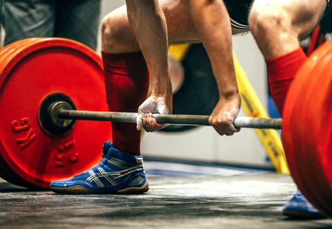 closeup of powerlifter to prepare exercise deadlift
