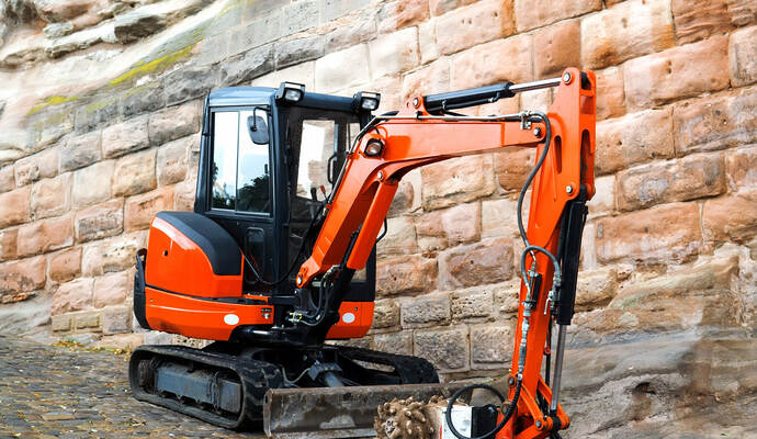 Red mini excavator