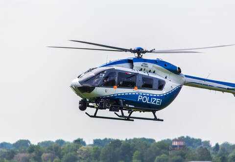 dusseldorf, nrw/germany - 12 05 18: german police helicopter in the air at dusseldorf airport germany