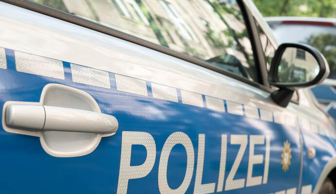 German News Concept: Blue Police Car, Selected Focus