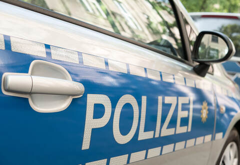 German News Concept: Blue Police Car, Selected Focus